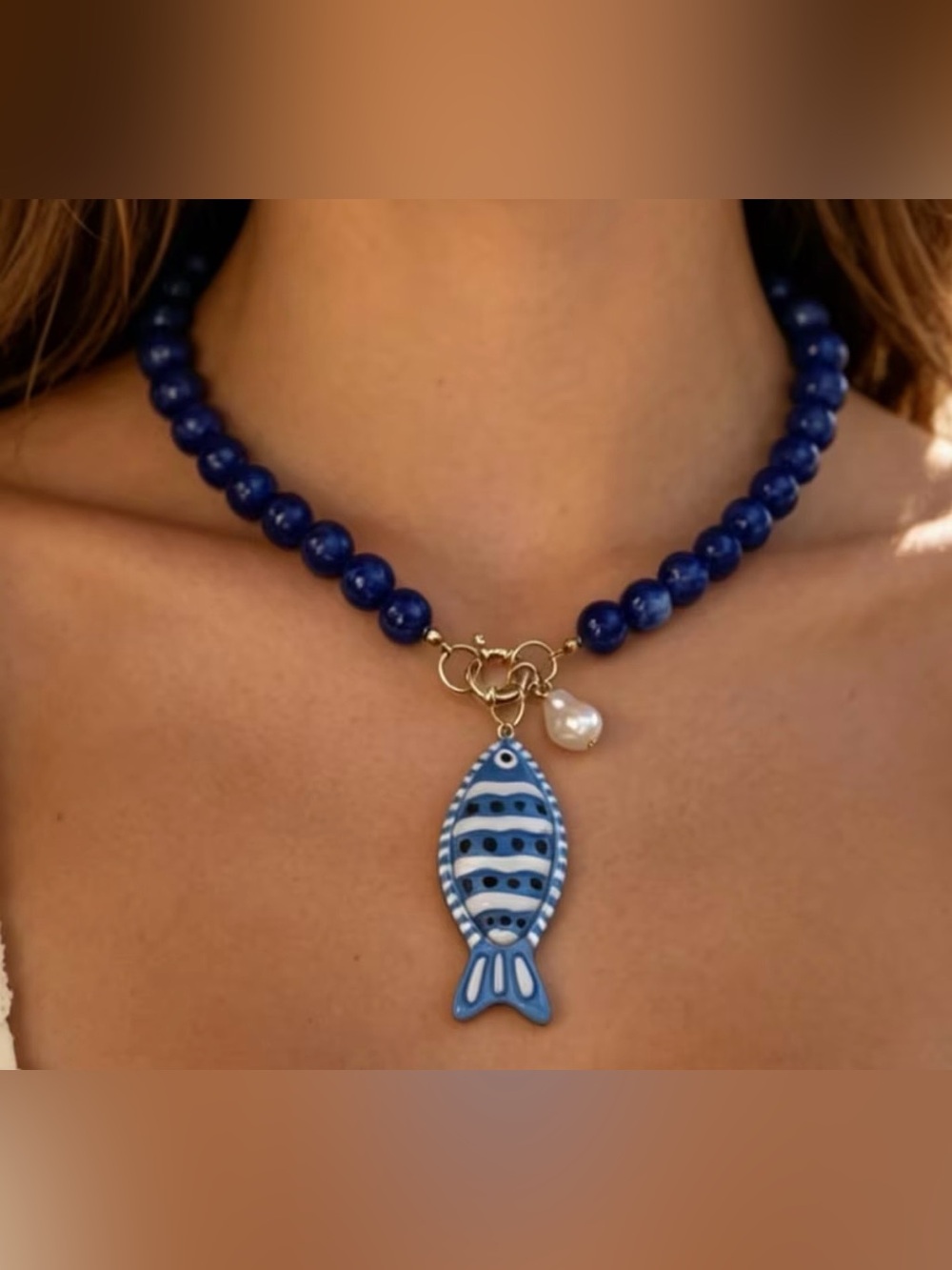 Blue Beaded Necklace with Fish Charm and Baroque Pearl Accent